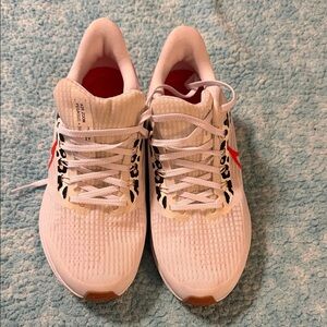 Nike White and Red Women's Sneakers with Leopard Accents